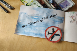 Sketchbook Seite mit Text "der Himmel gehört allen"