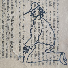 Bettler auf Zeitungspapier
